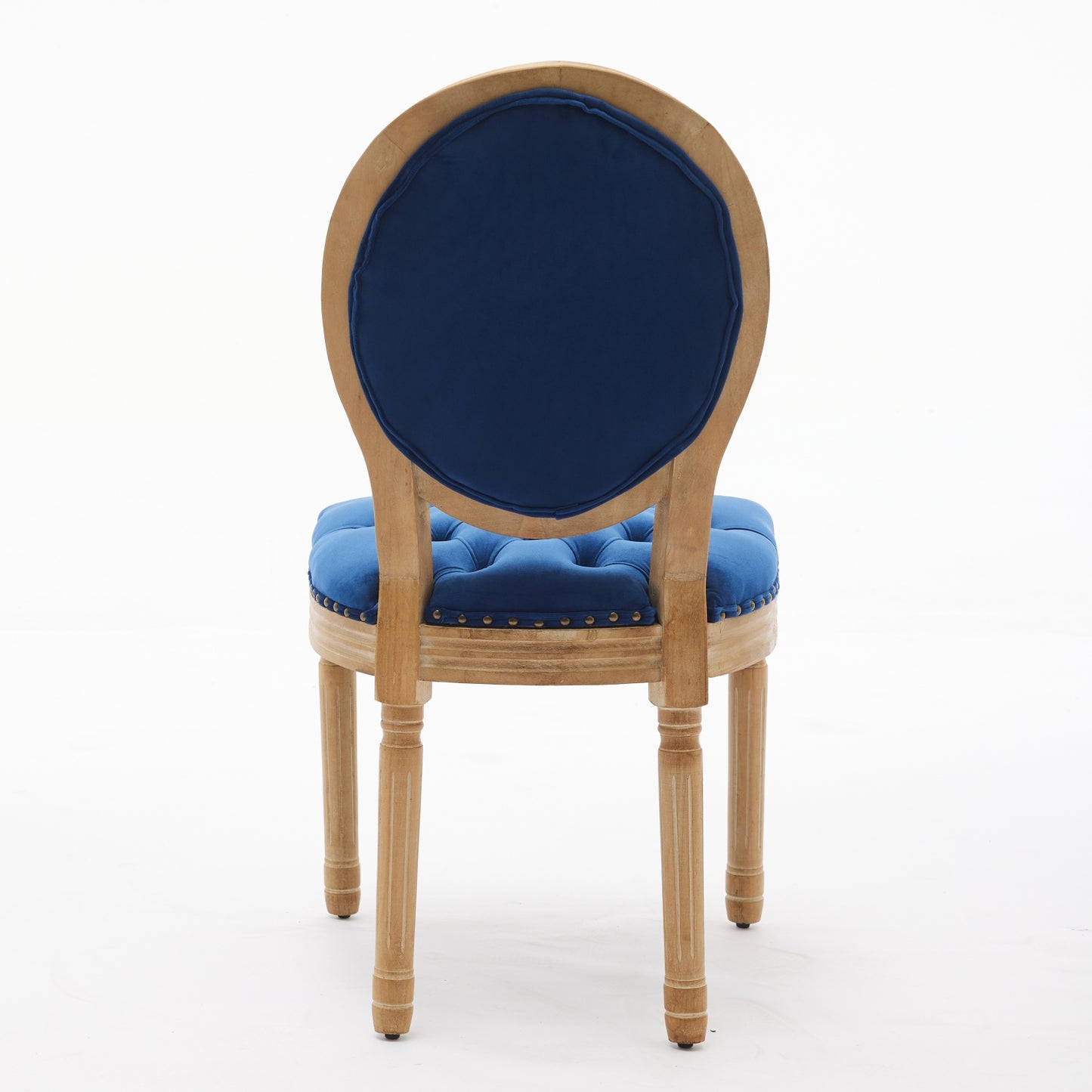 Dark blue velvet upholstered chair with distressed wood frame