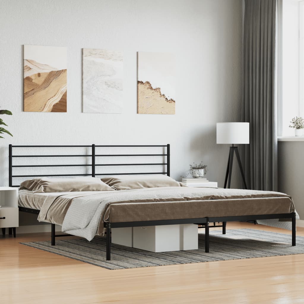 Black metal bed frame with minimalist headboard and grey patterned bedding