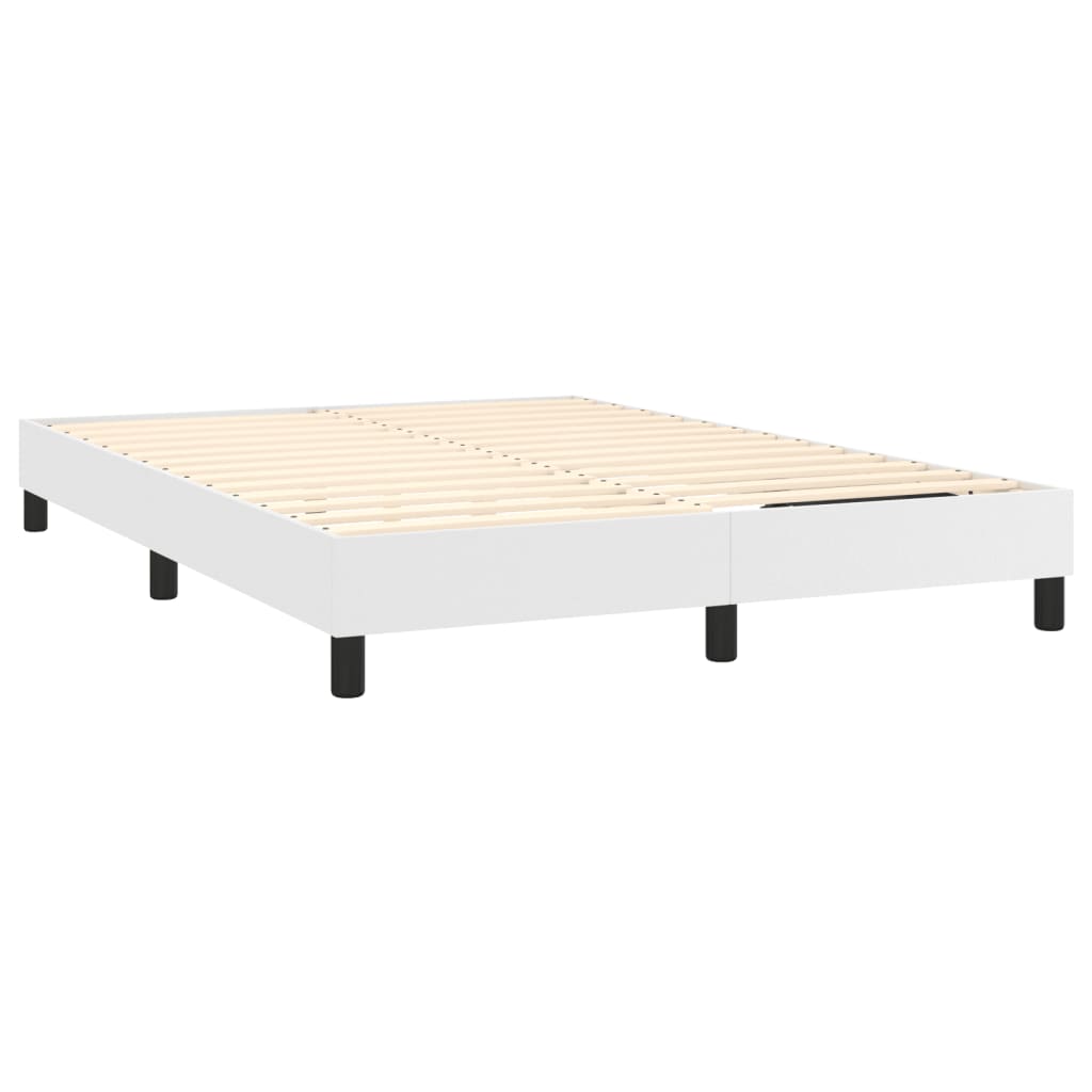 White upholstered bed frame with black legs
