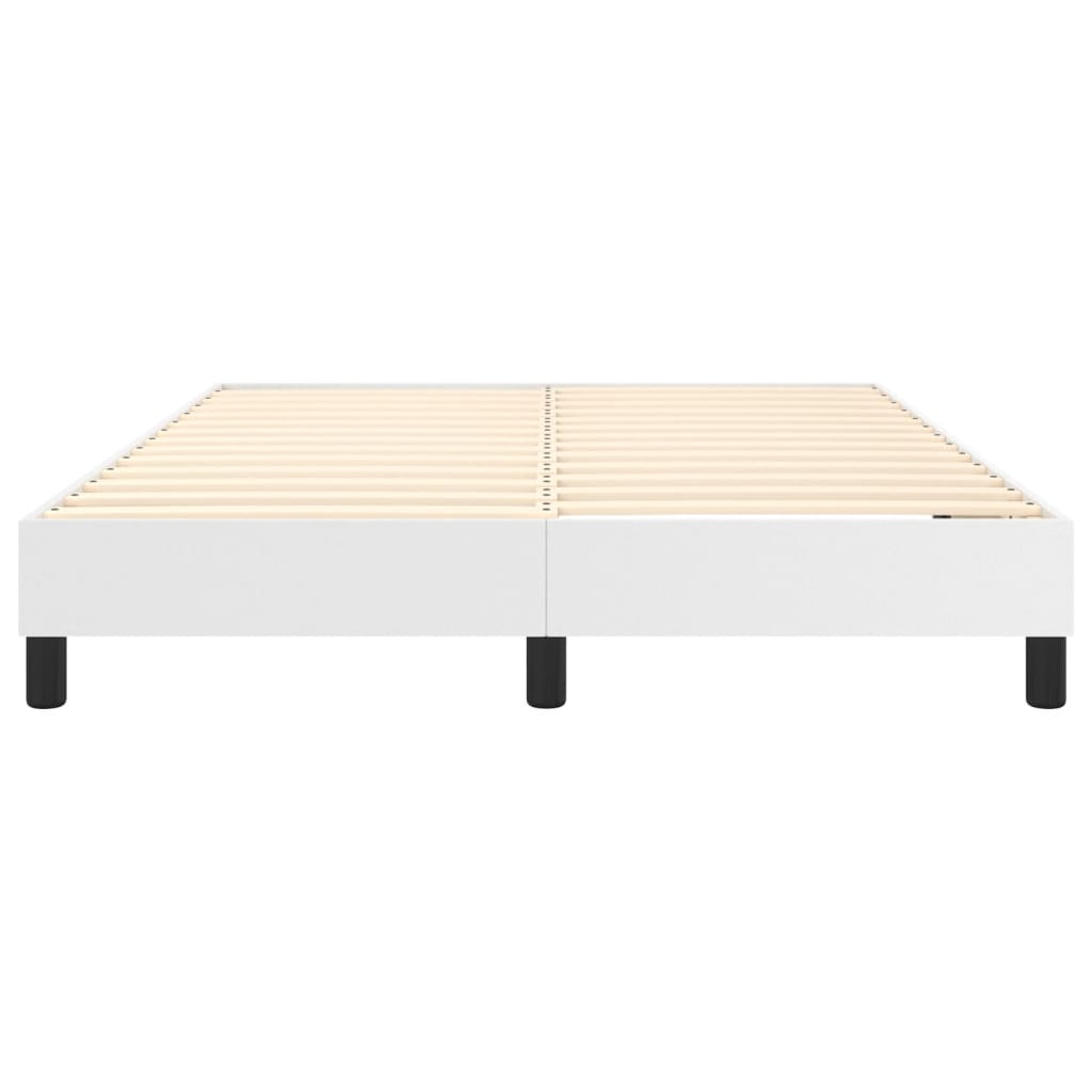 White platform bed frame with wooden slats and black legs