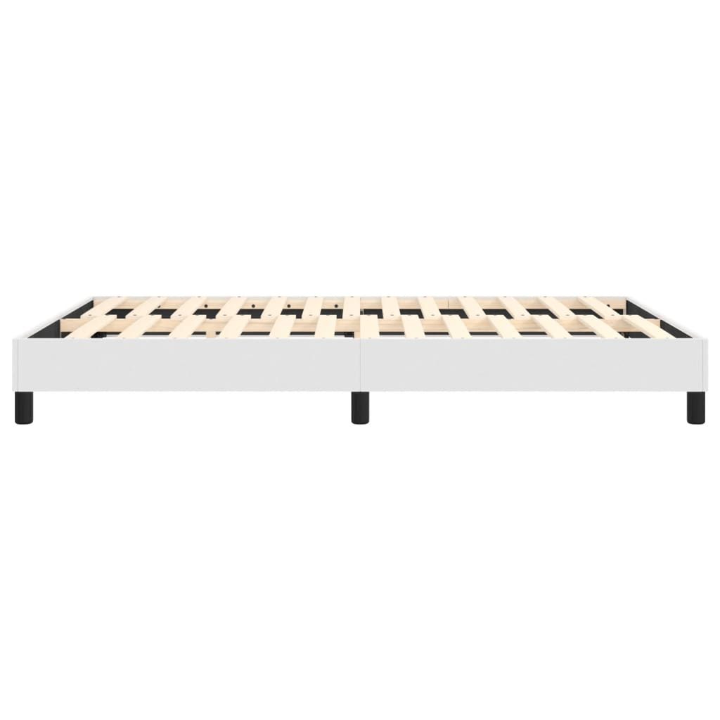 White platform bed frame with wooden slats and black legs