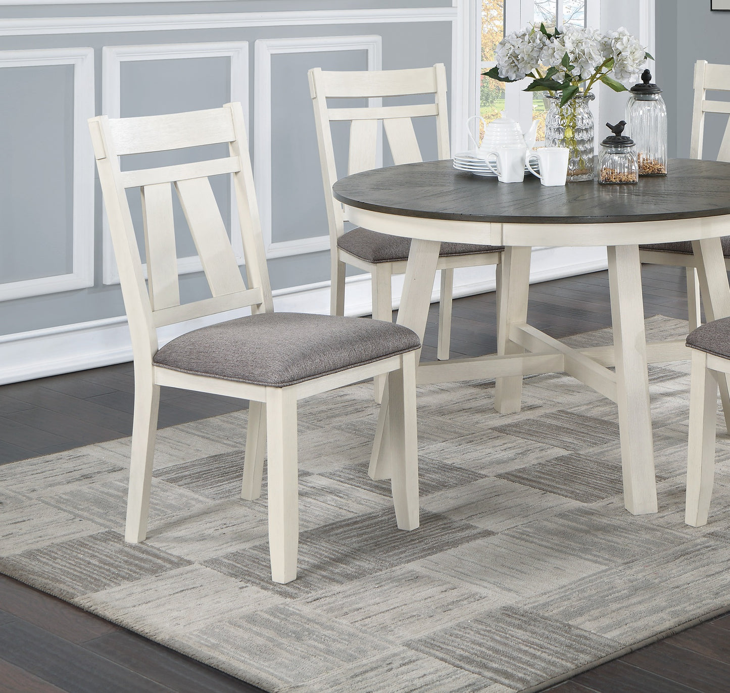 Cream distressed dining chair with gray upholstered seat
