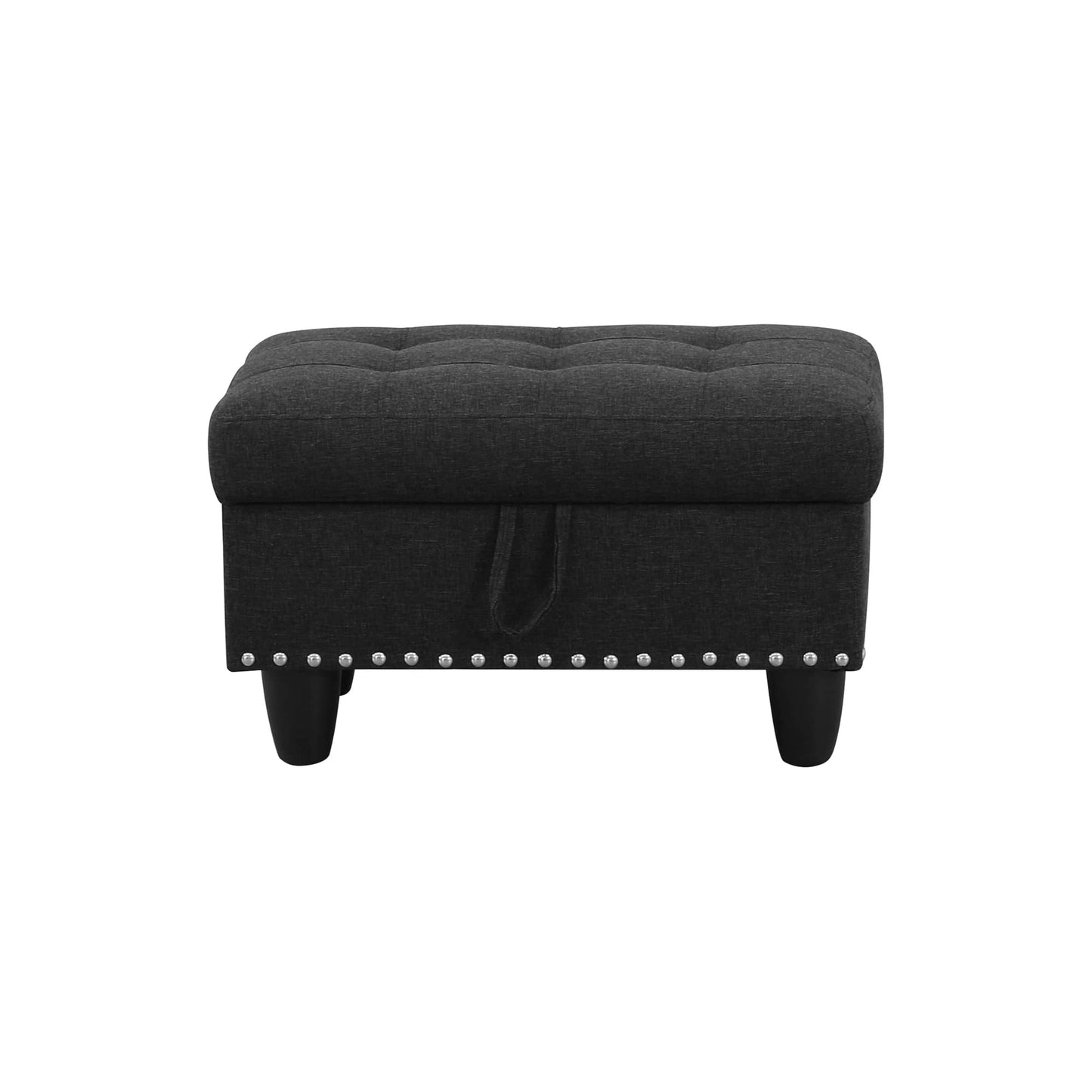 Dark gray tufted storage ottoman with silver nailhead trim in living room