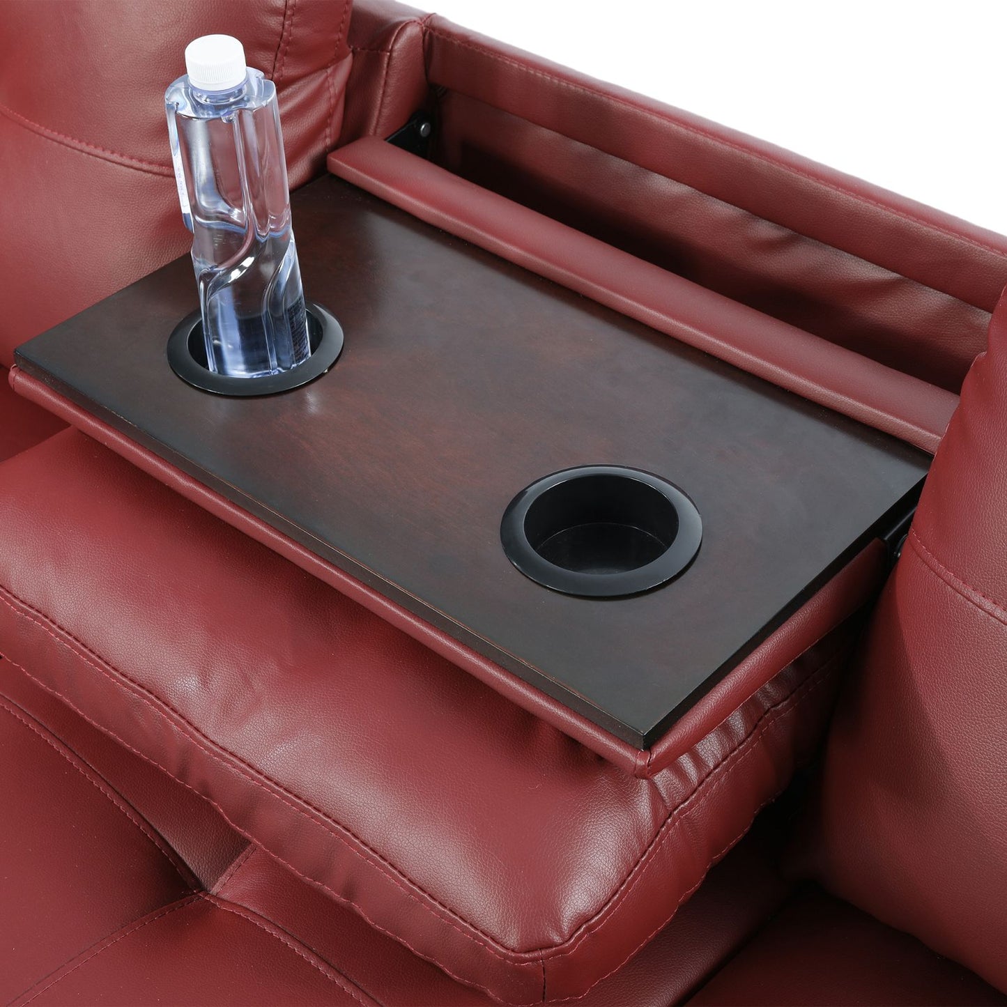 Red leather sofa with dark wood tray cup holders for home theater