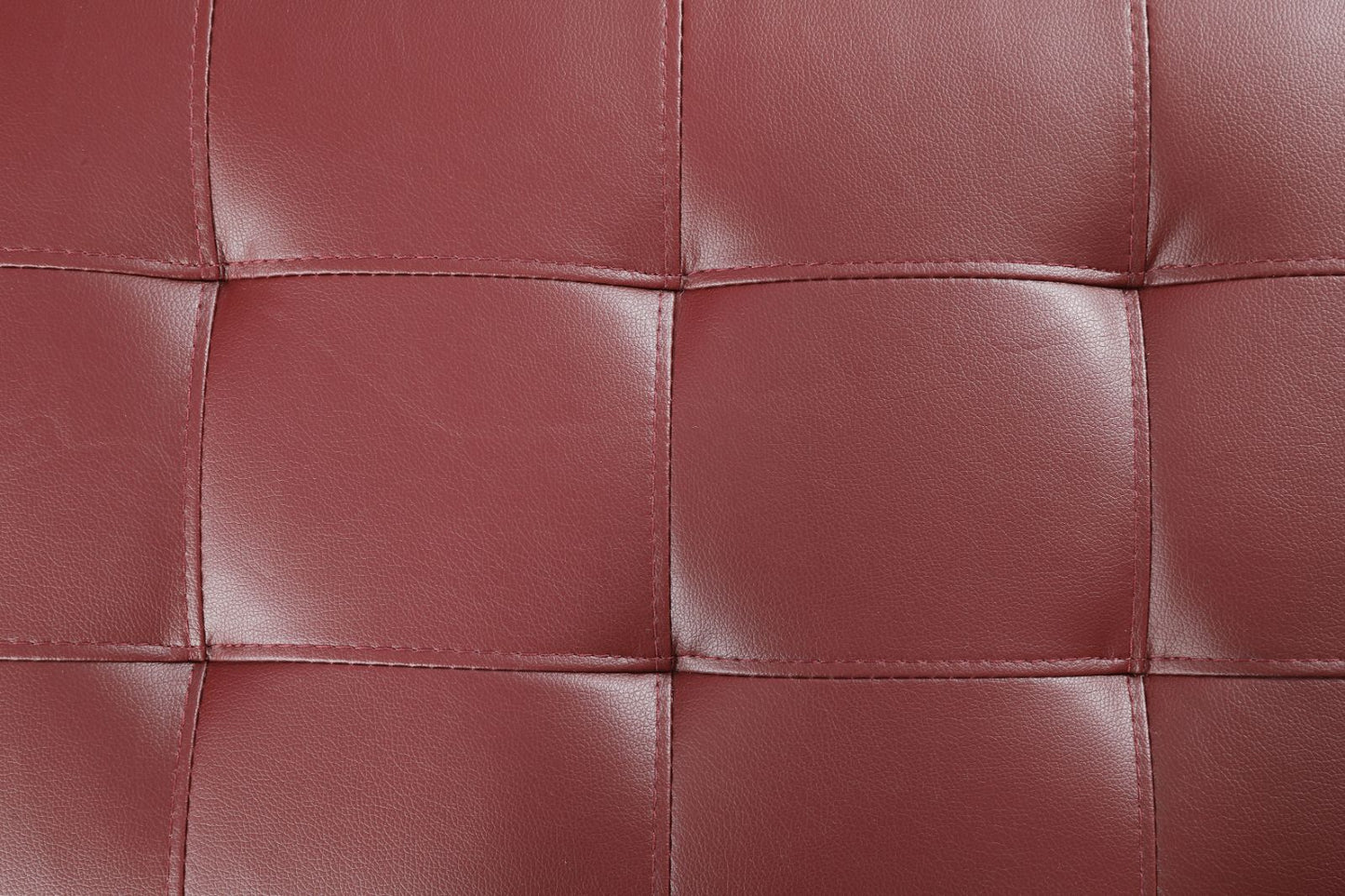Deep burgundy quilted leather seat cushion with precise stitching