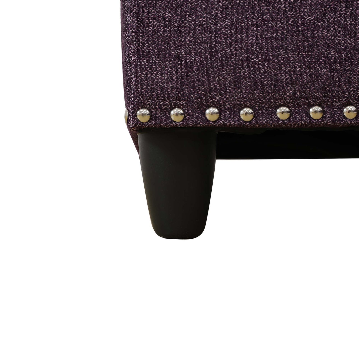 Purple upholstered stool with silver button accents and dark wooden leg