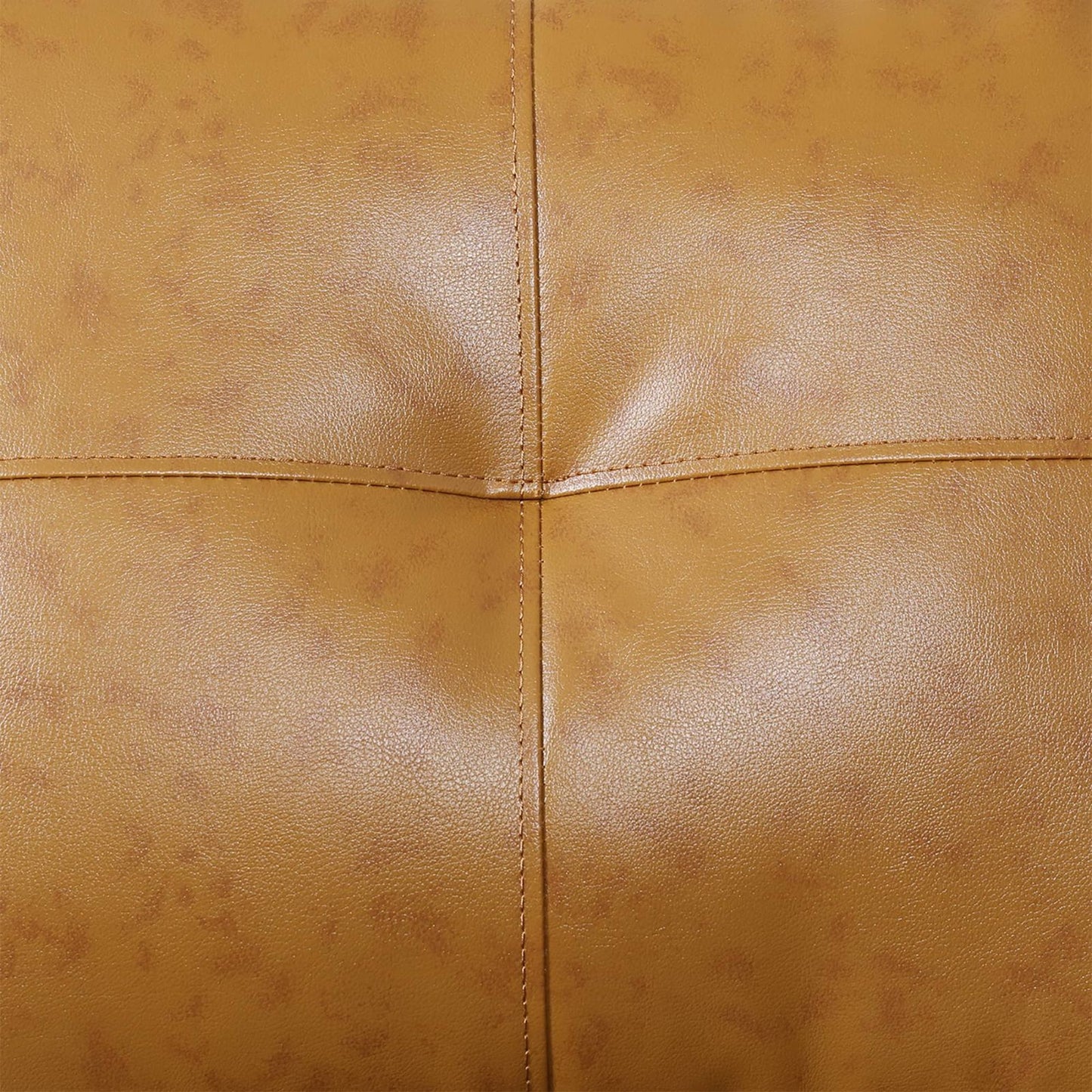 Soft tan tufted leather sofa upholstery with stitching