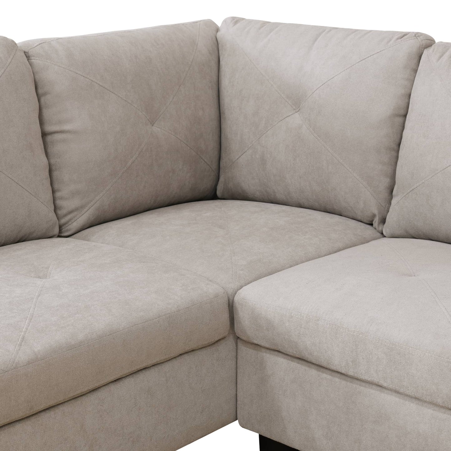 Light beige upholstered sectional sofa corner