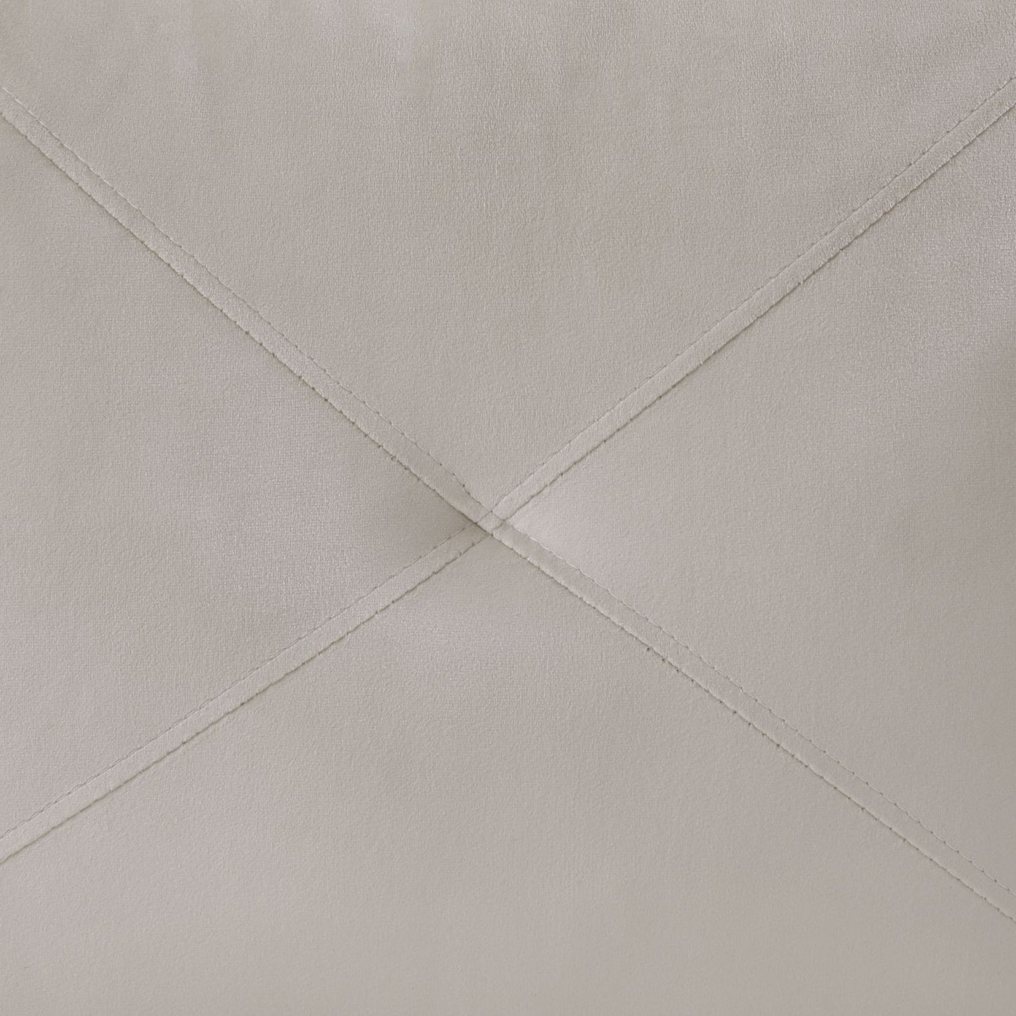 Grey faux leather tufted accent chair detail