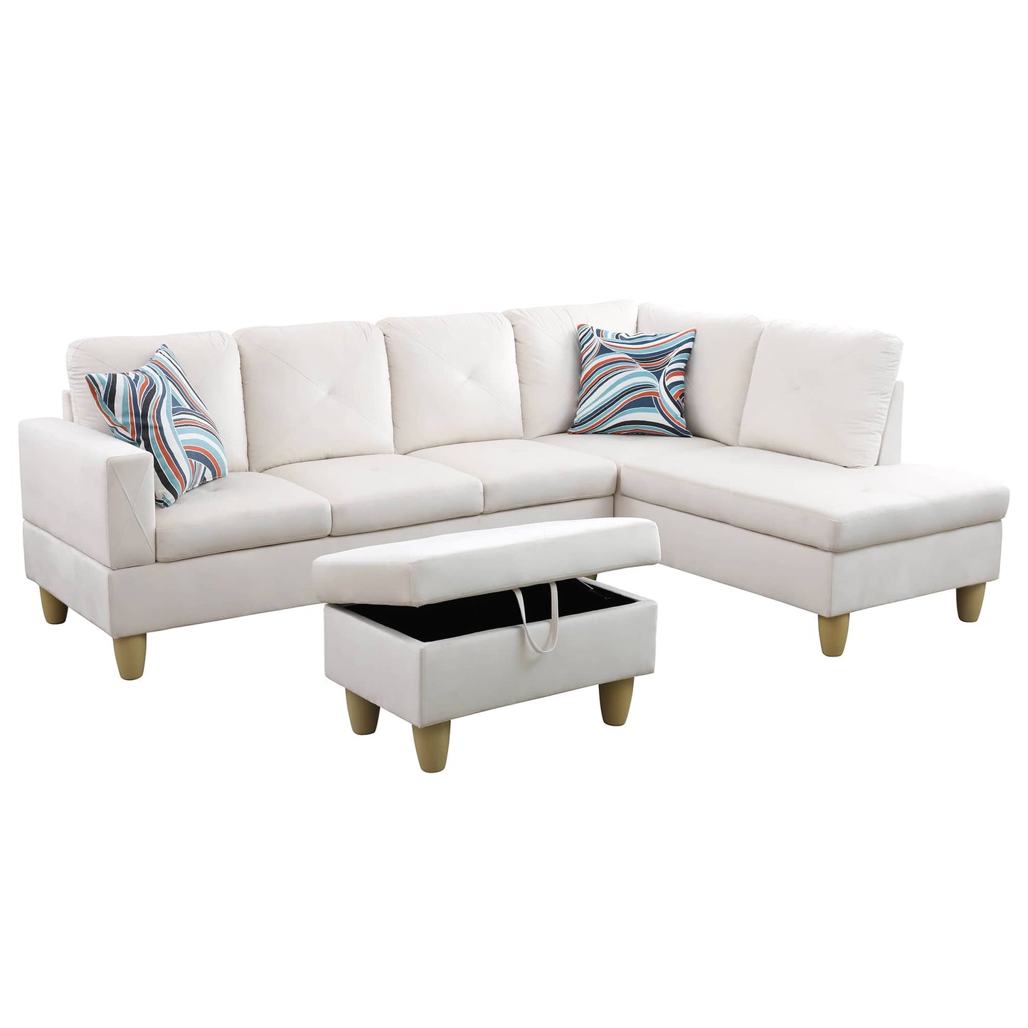 White sectional sofa with patterned accent pillows and open storage ottoman