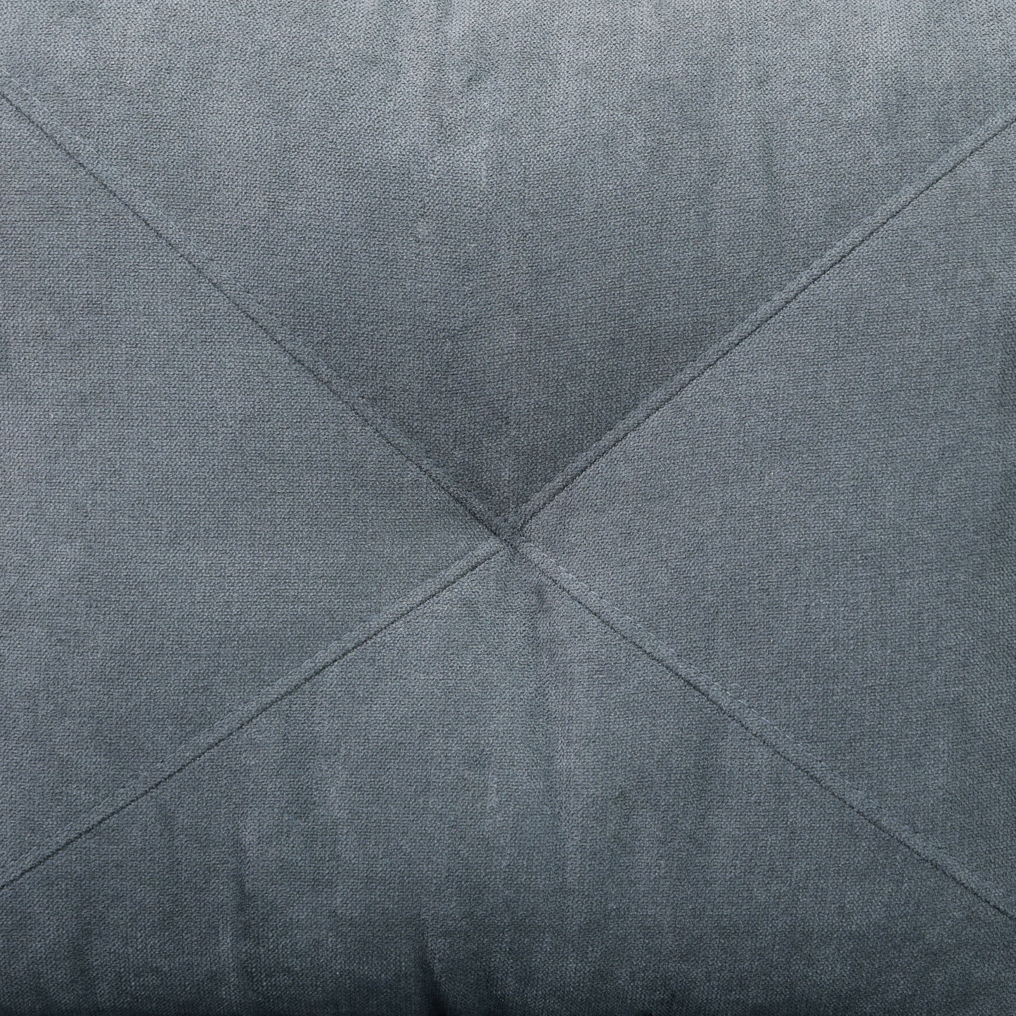 Closeup of a grey woven fabric texture with diamond stitching detail