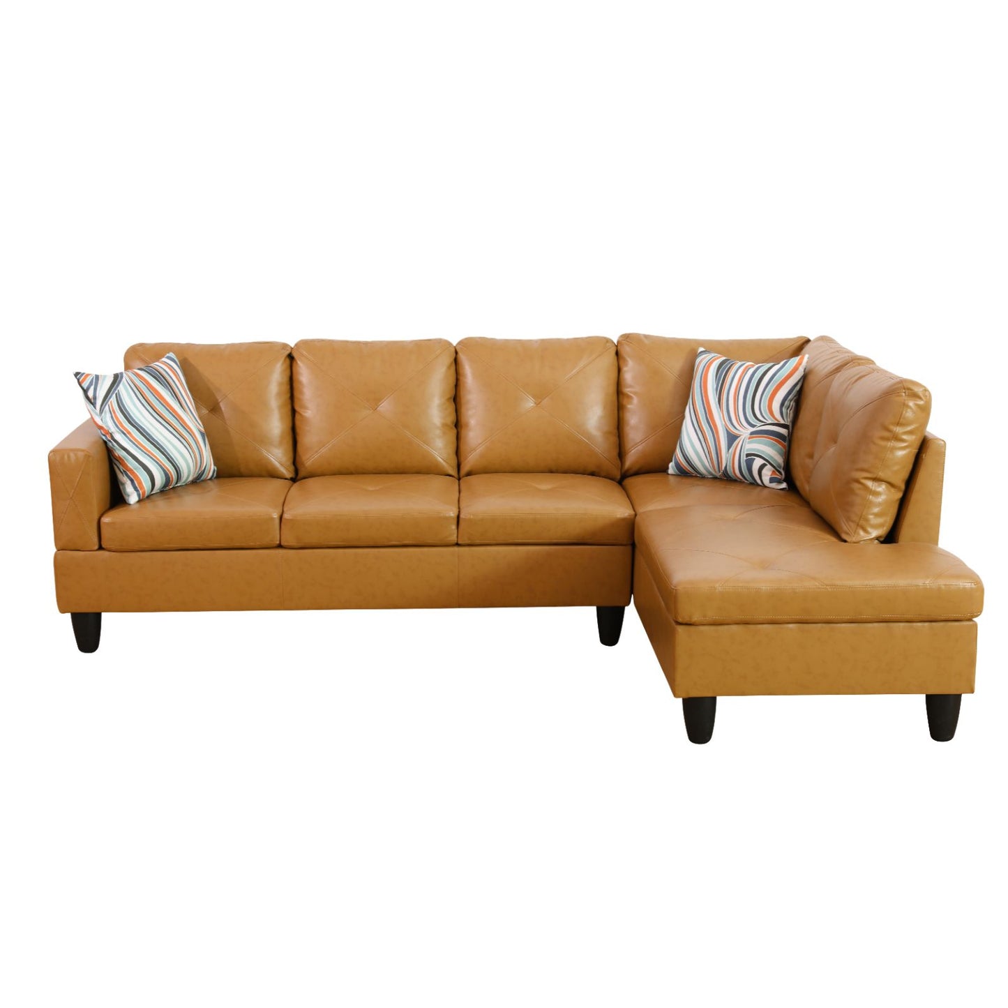 Tan faux leather Lshaped sectional sofa with diamond tufting and abstract patterned pillows