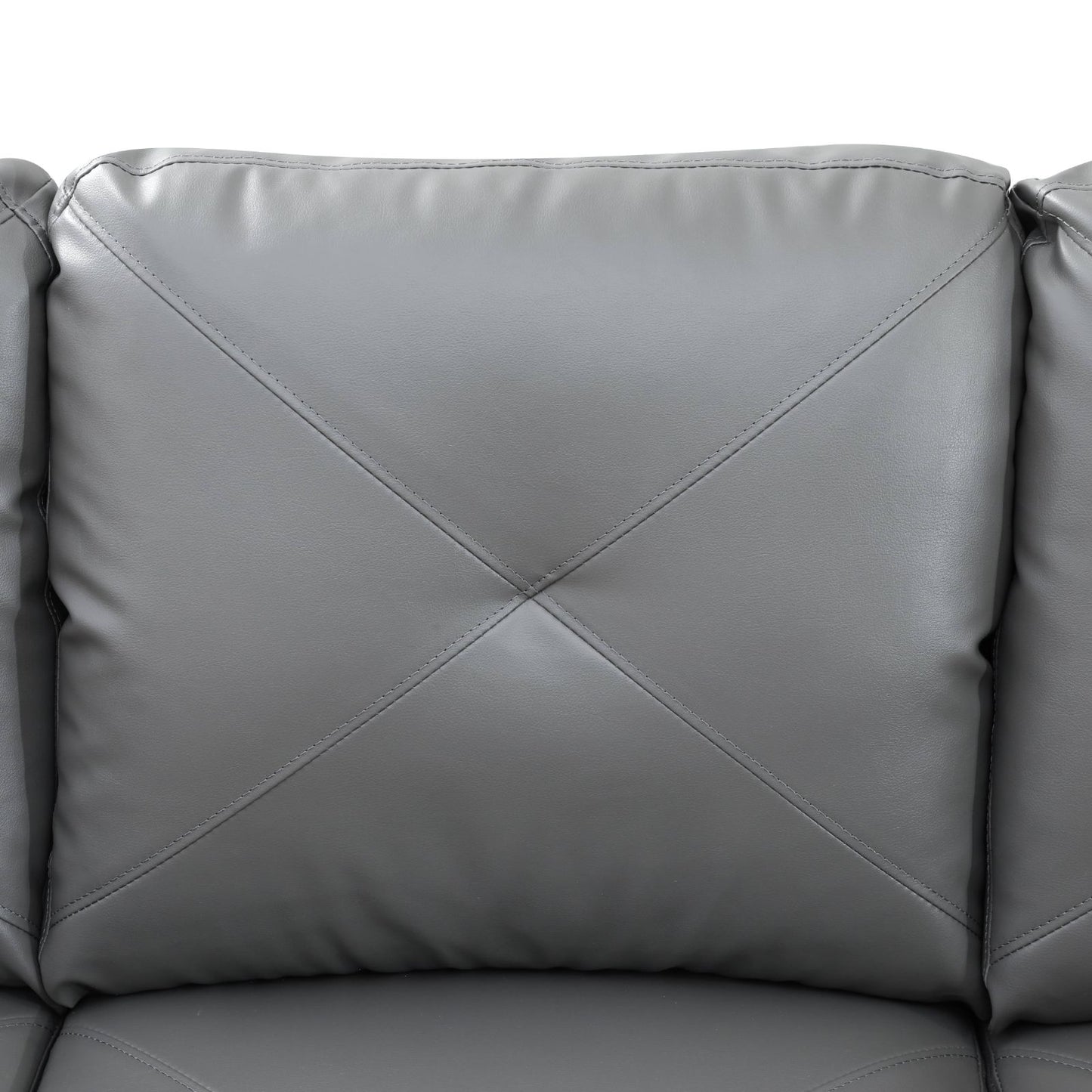 Gray faux leather sofa cushion with diamond tufting