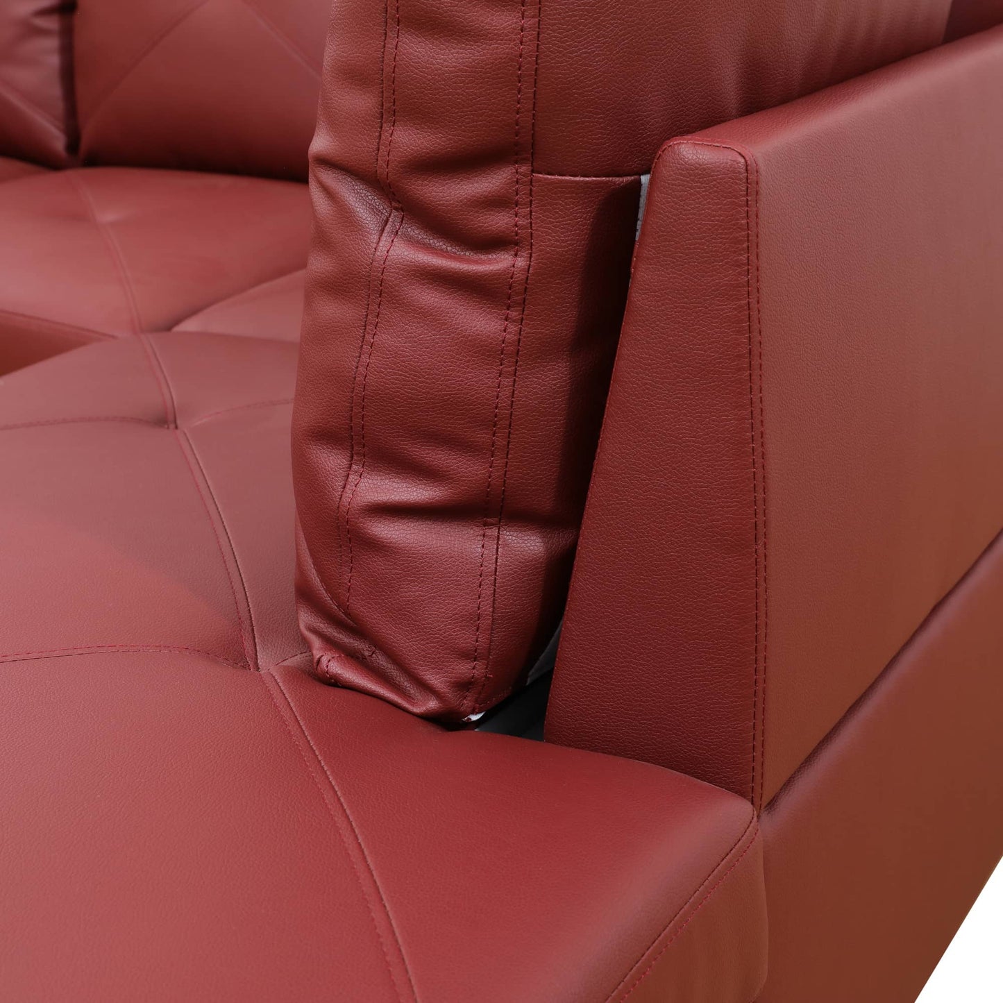 Red leather sectional sofa armrest and cushion detail