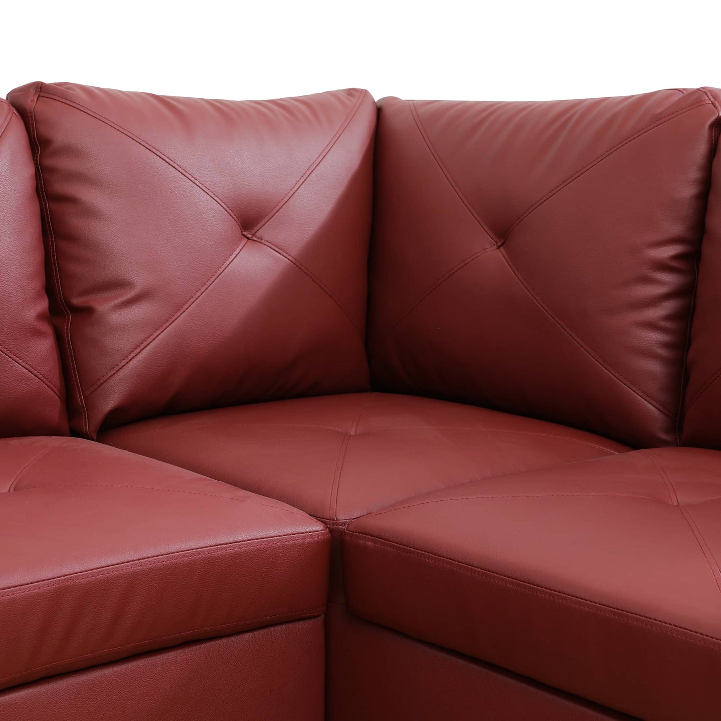 Red leather sectional sofa with diamond tufting and contrast stitching