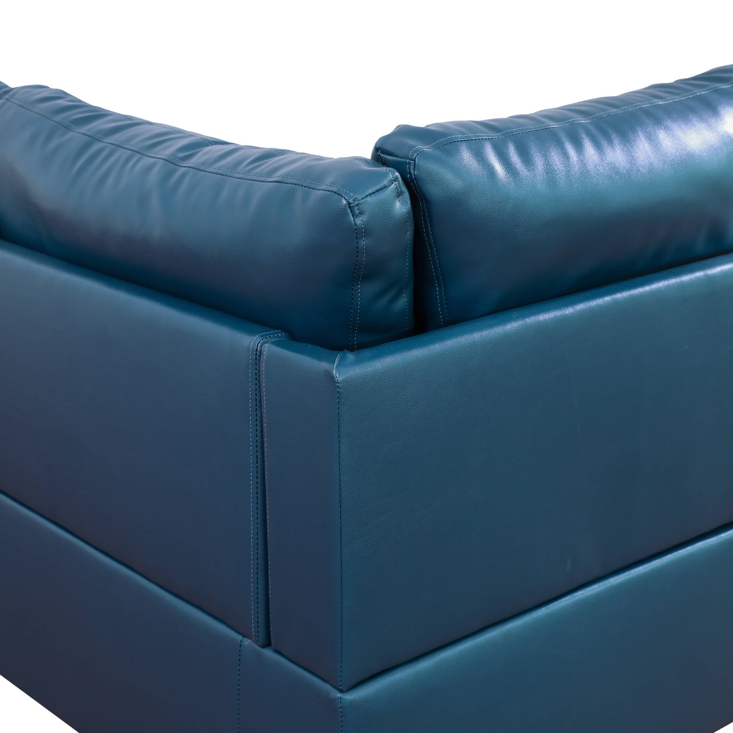Teal leather sectional sofa corner with tufted cushions for modern living room decor