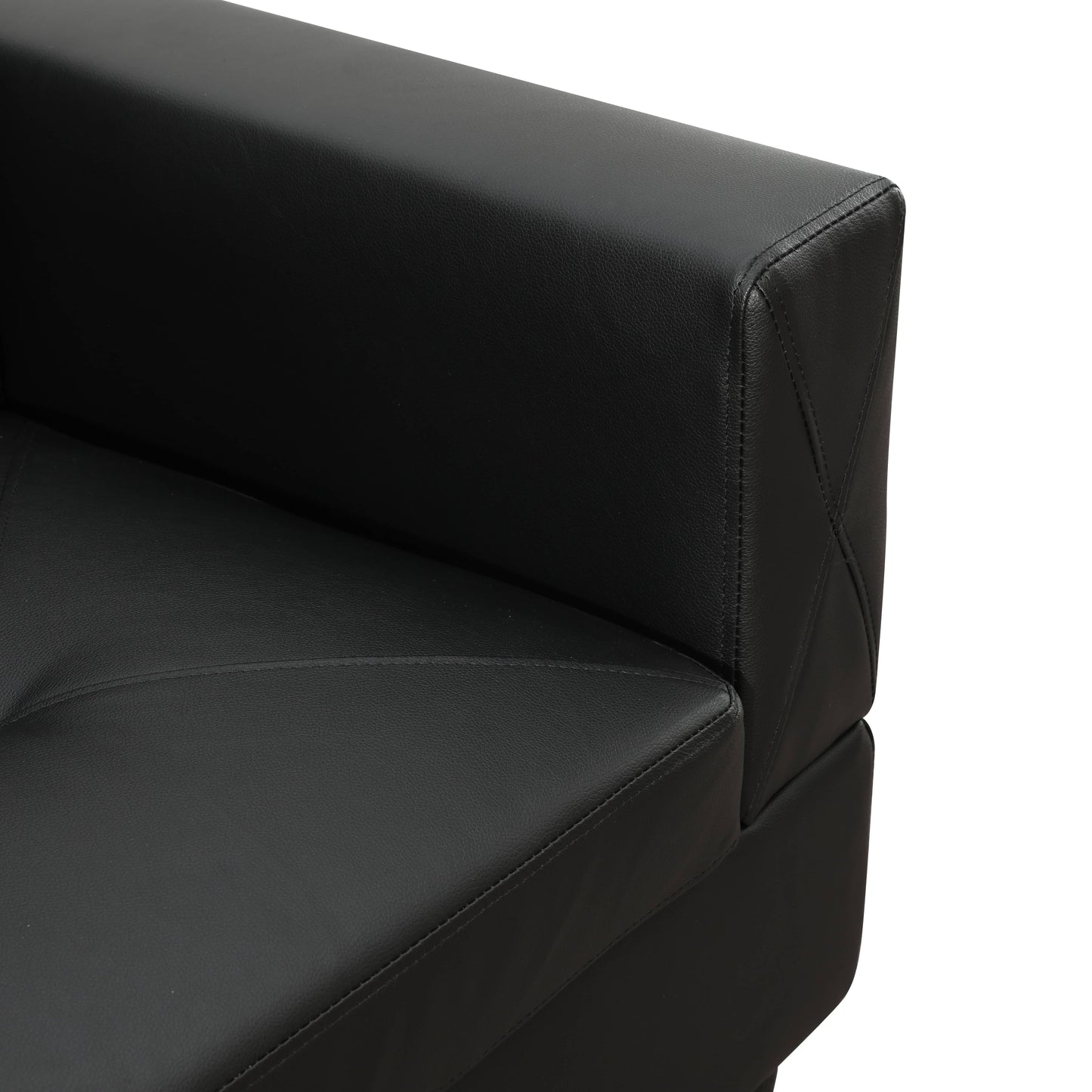 Black faux leather armchair detail with stitched diamond pattern