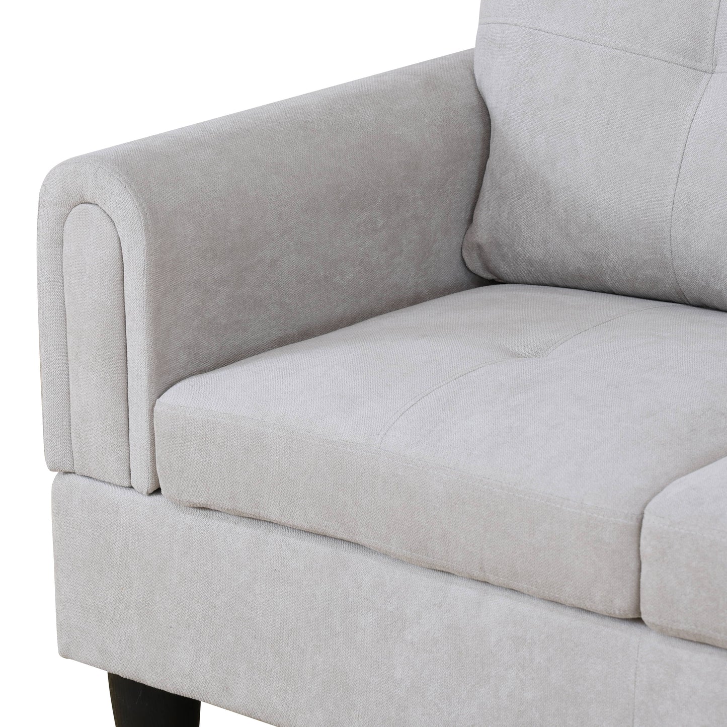 Light gray fabric sofa armrest with curved detail