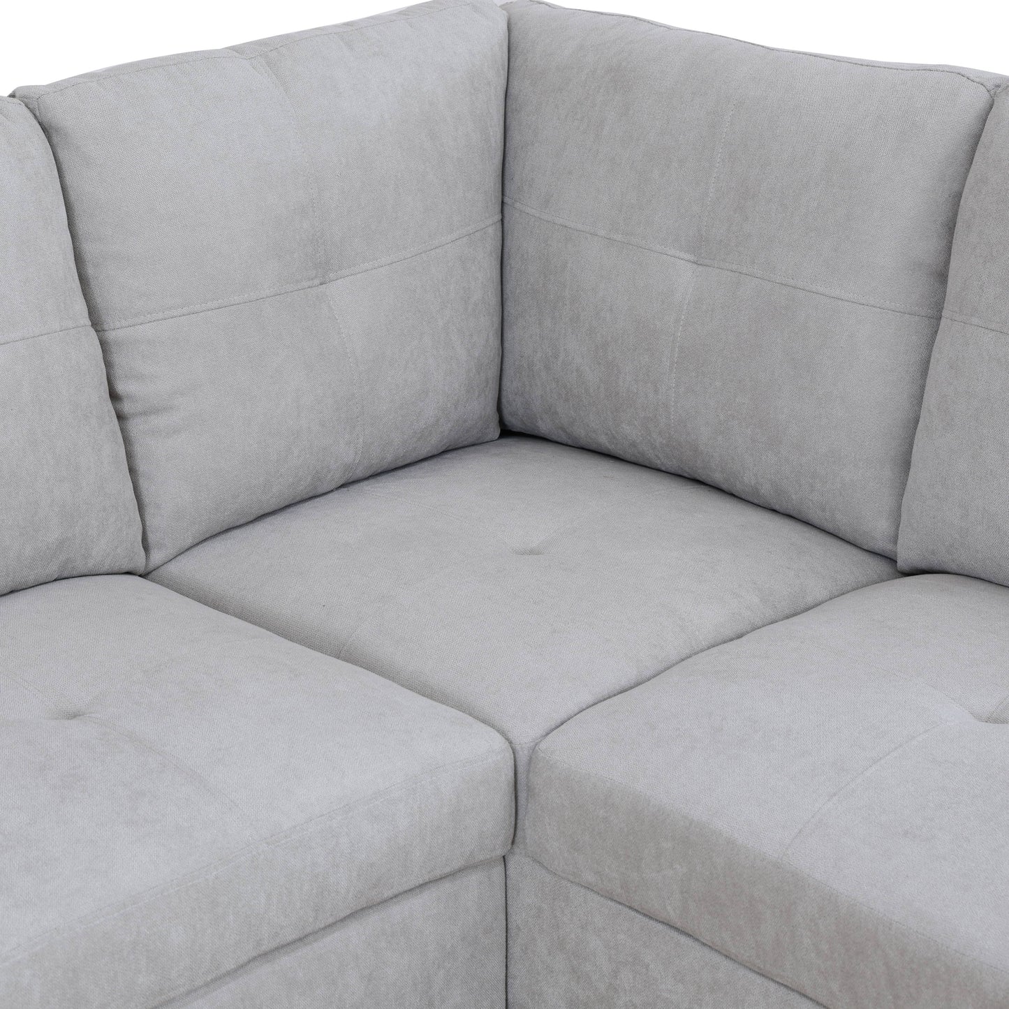 Light grey textured fabric sectional sofa corner detail