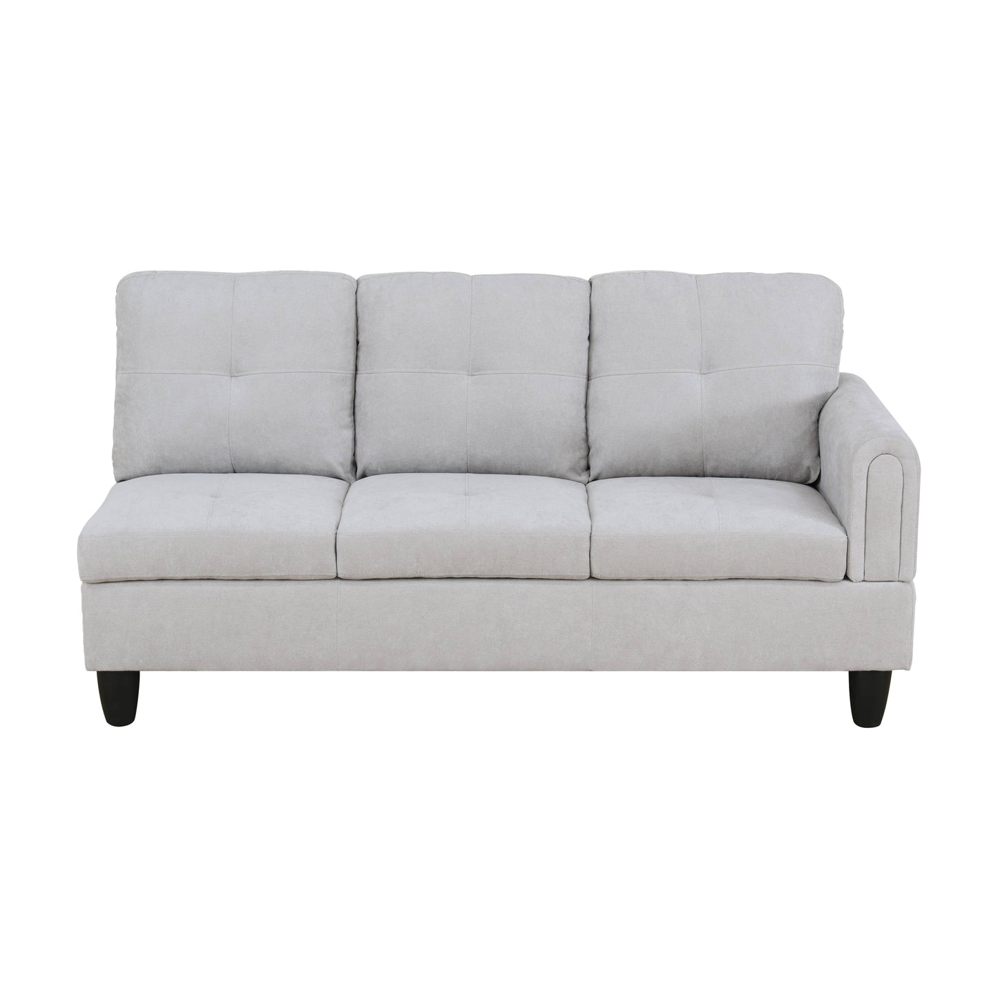 Light gray upholstered sectional sofa with tufted cushions