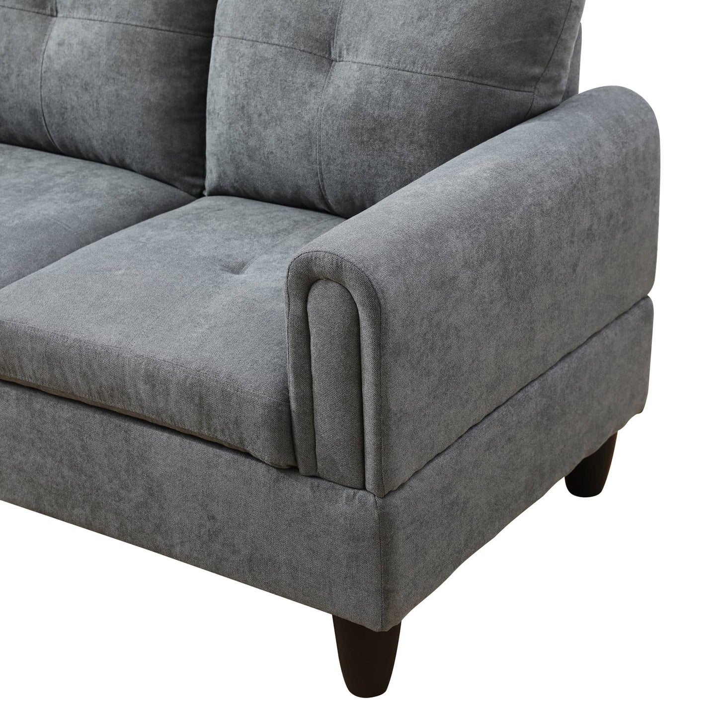 Close up of a grey fabric sofa armrest