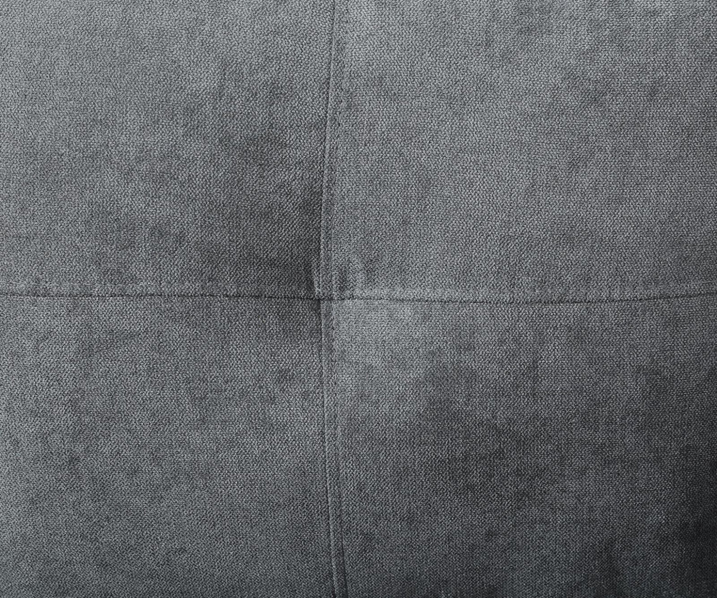 Dark grey textured fabric detail with visible stitching seams