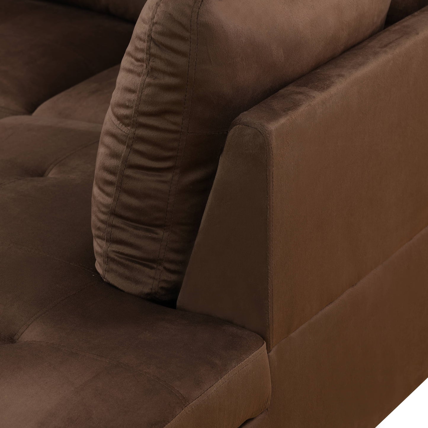 Brown velvet sectional sofa armrest with tufted cushion detail