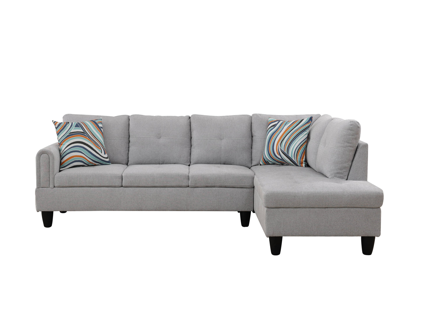 Gray fabric sectional sofa with colorful striped accent pillows
