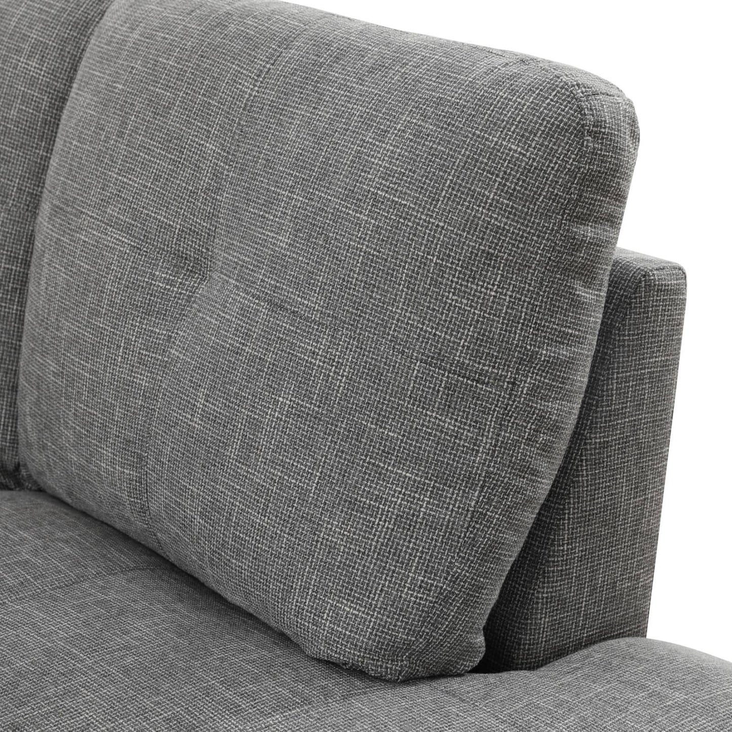 Closeup of textured grey fabric sofa cushion with subtle woven pattern