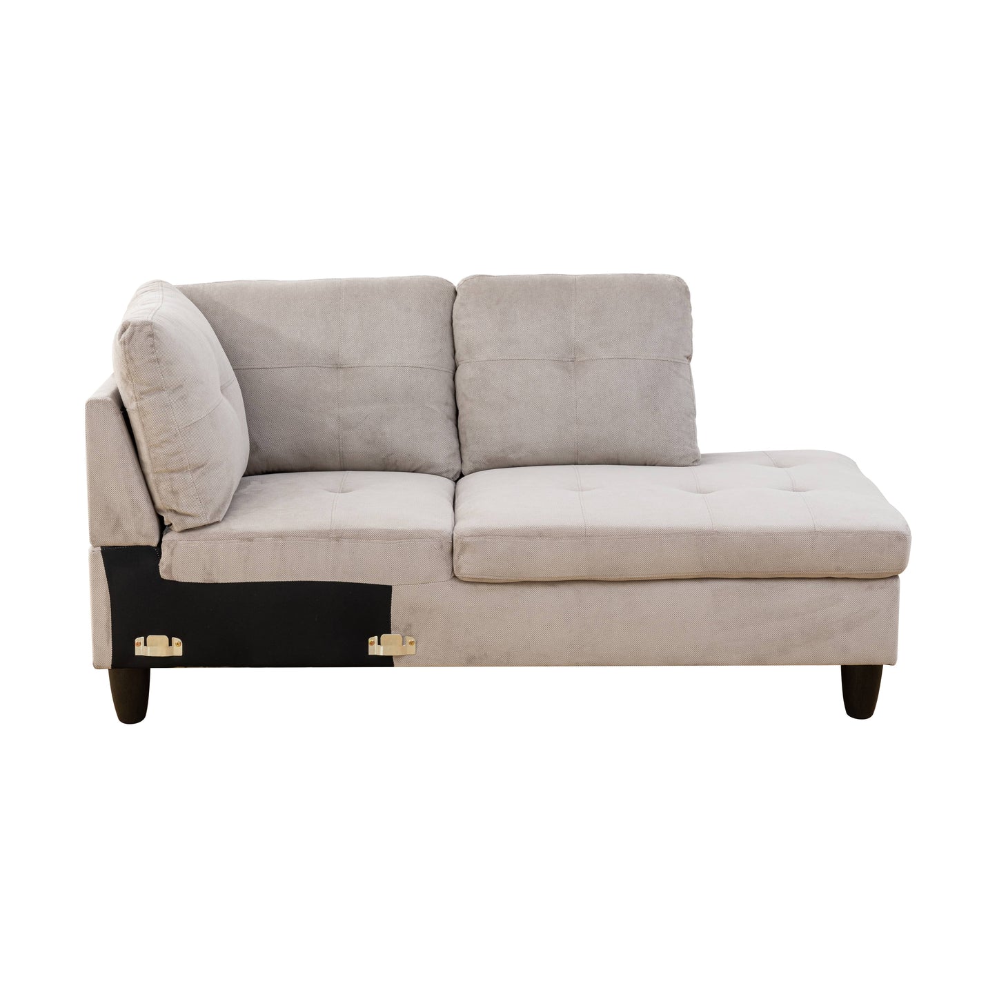 Light gray sectional couch with tufted seat cushions