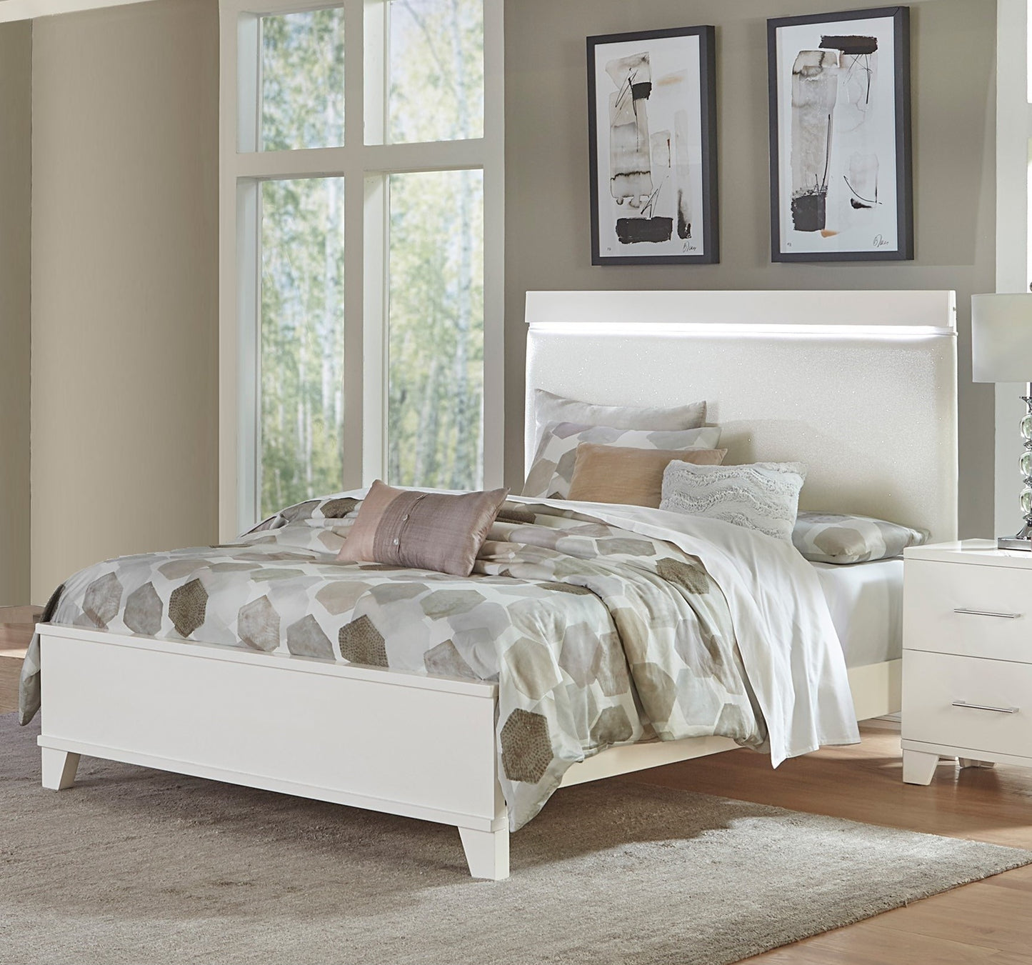 Modern white platform bed with LED headboard and stonepatterned bedding