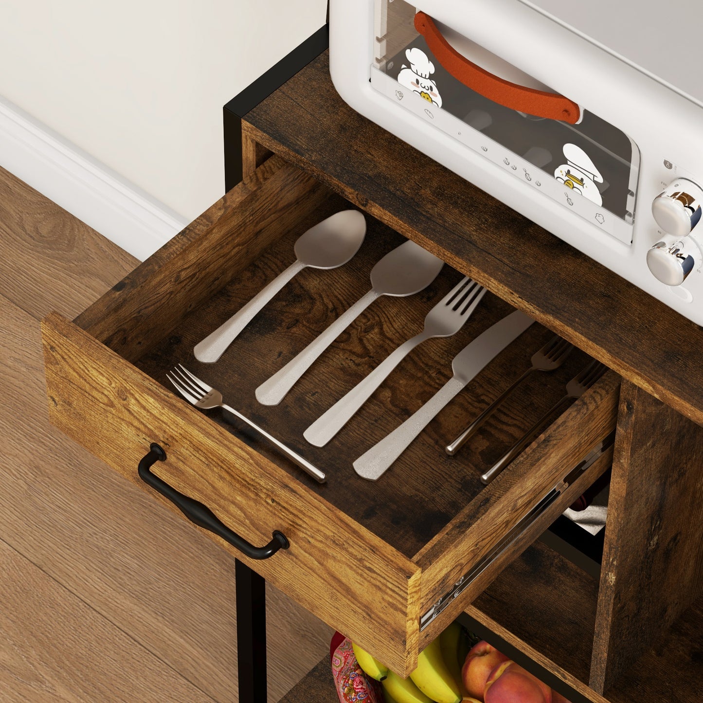 Silverware set including spoons and forks in a wooden drawer