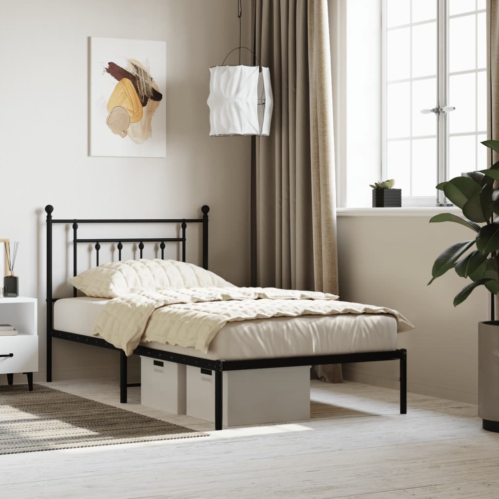 Black metal twin bed frame with decorative headboard