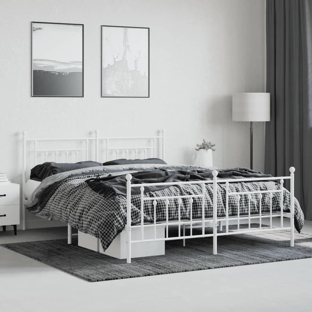 White metal twin bed frame with decorative finials and slatted base