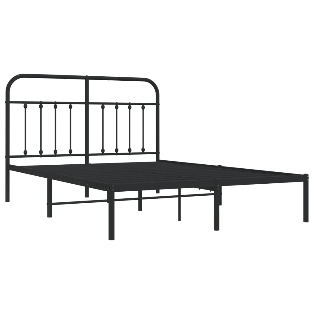 Black metal platform bed frame with curved headboard and decorative spindles