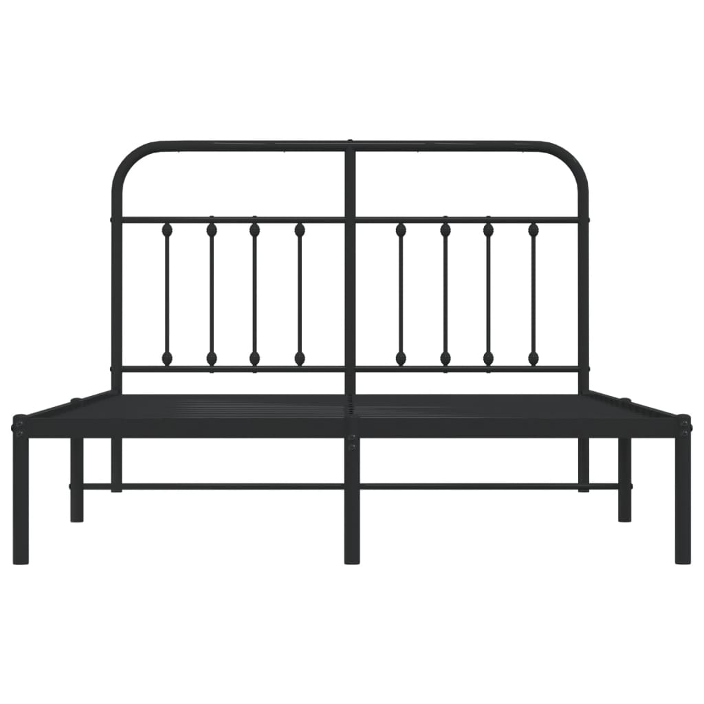 black metal bed frame with arched headboard and white mattress