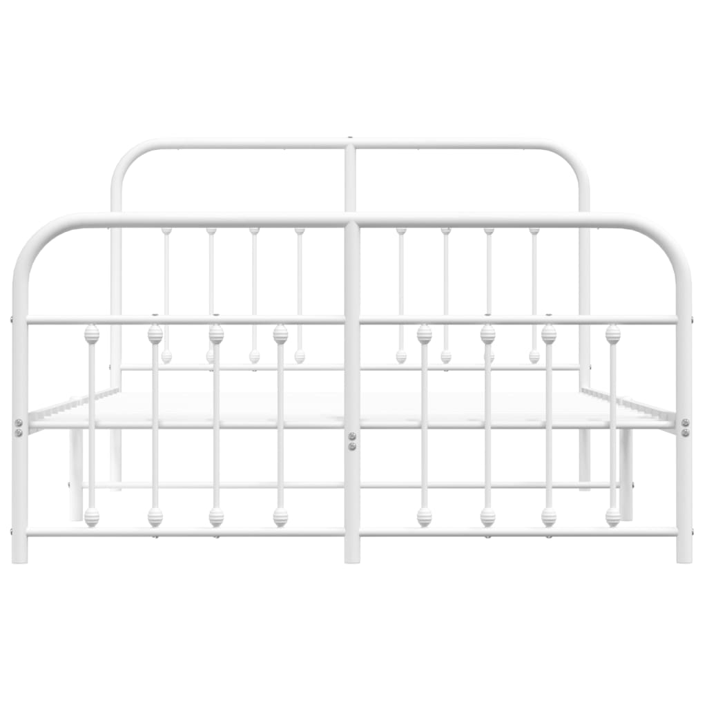 White metal bed frame with ornate detailing and mattress