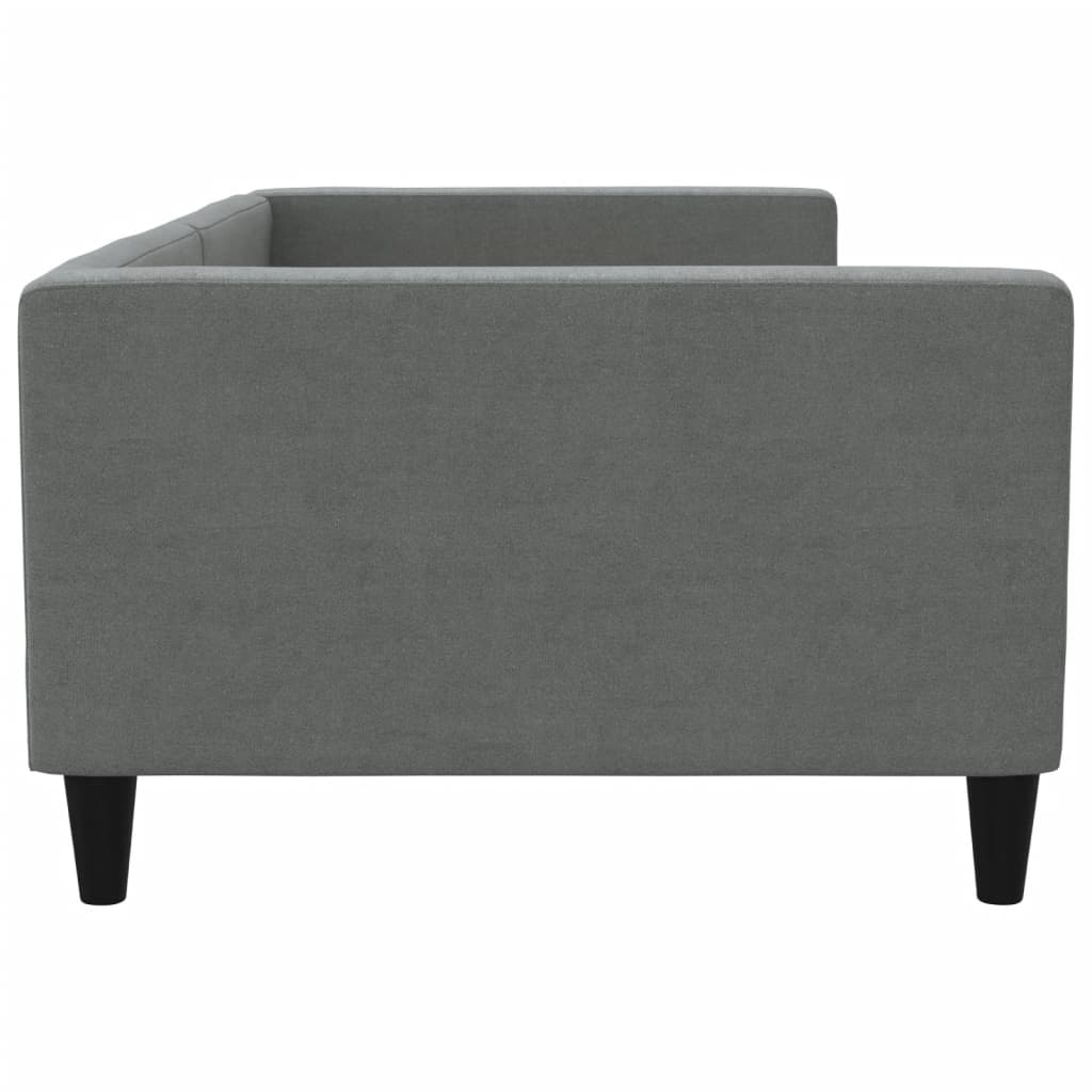 Grey upholstered sofa with exposed wooden slats