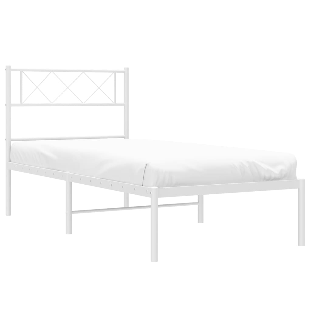White metal twin bed frame with diamondpatterned headboard