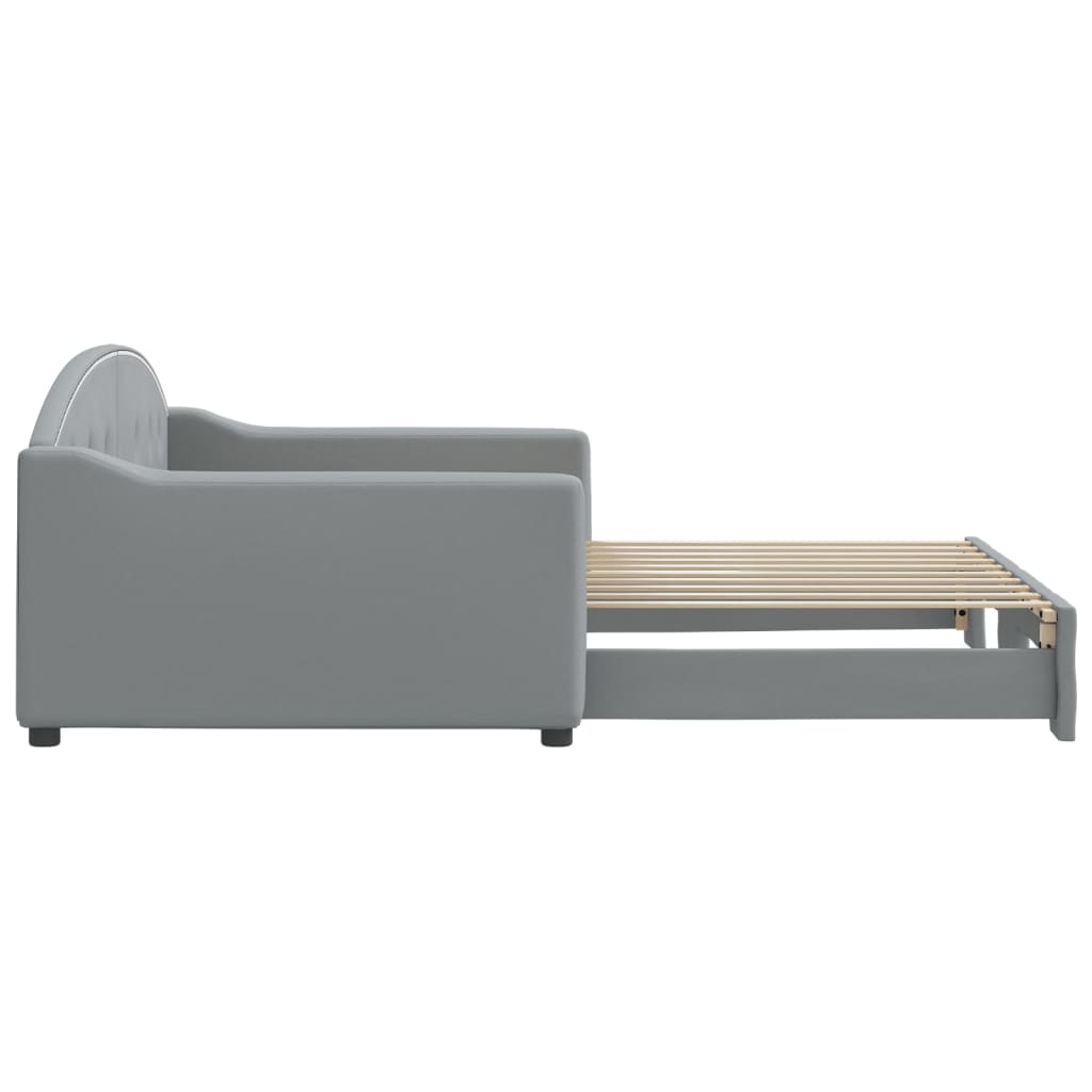 Tufted grey fabric daybed with wooden slats