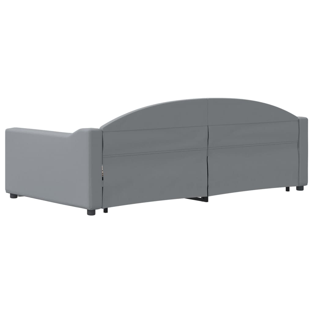 Grey upholstered sofa bed with pullout wooden slatted base
