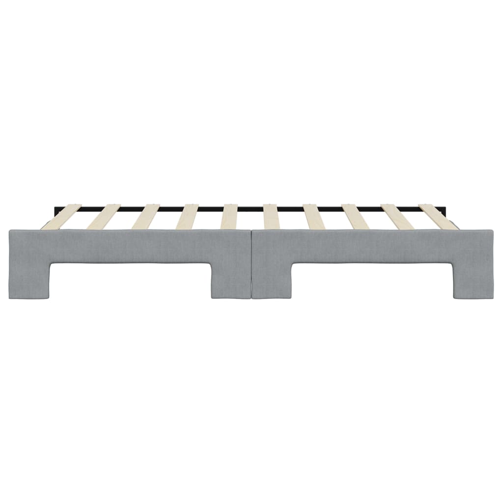 Gray upholstered twin bed frame with wooden slats
