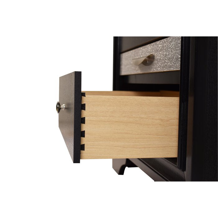Black nightstand with exposed dovetail drawer joint and silver knob