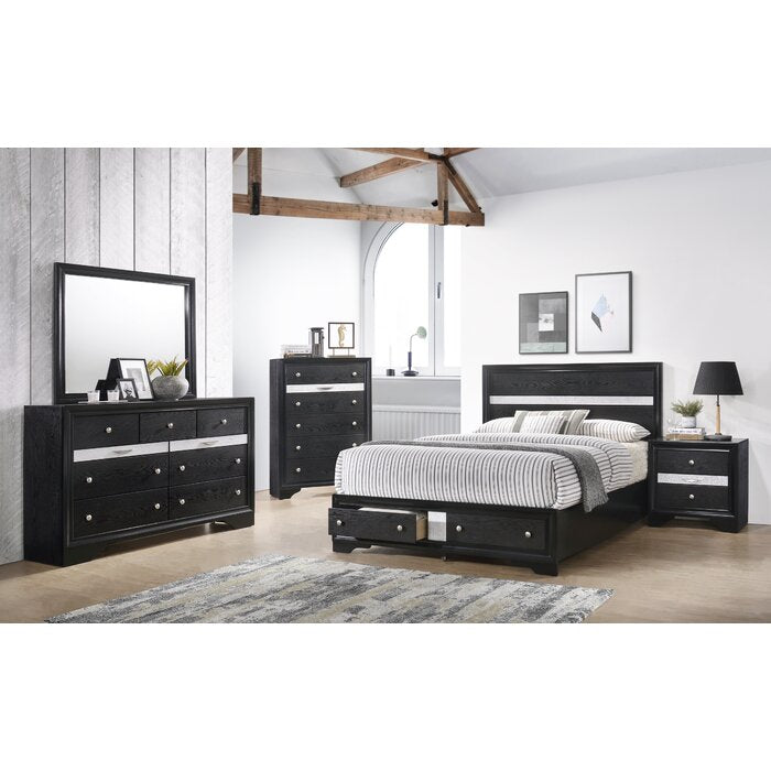 Black dresser with drawers and mirrored trim