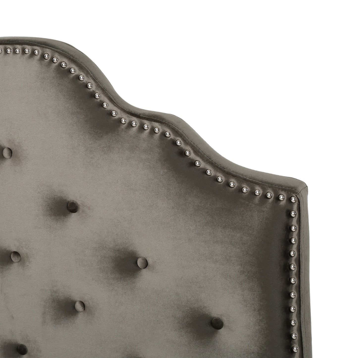 Grey velvet tufted headboard with nailhead trim