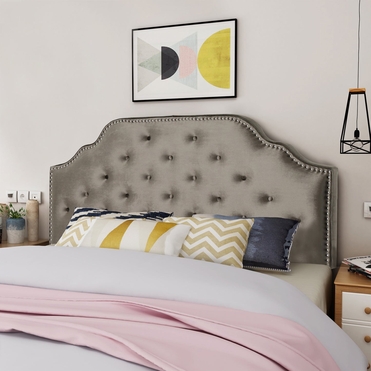 Grey velvet tufted headboard with silver nailhead trim