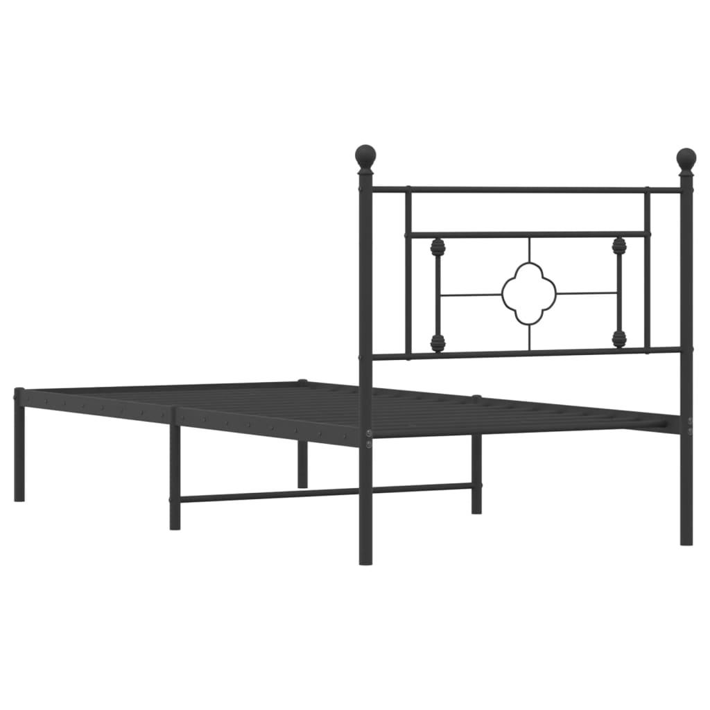 Black metal daybed with ornate headboard detail