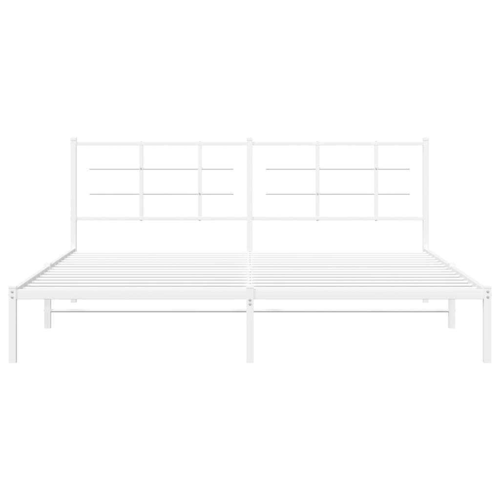 Modern white metal bed frame with a gridpatterned headboard and mattress