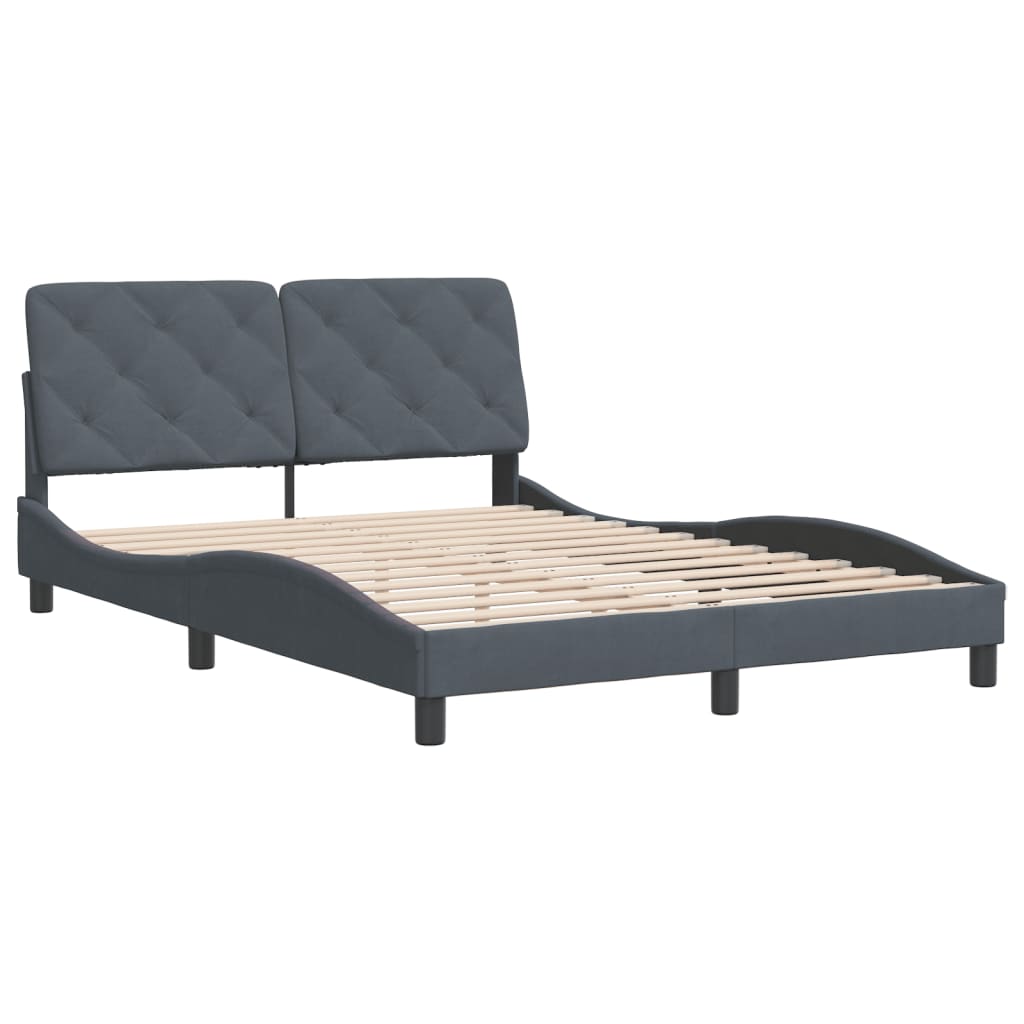 Dark gray upholstered bed frame with tufted headboard and mattress