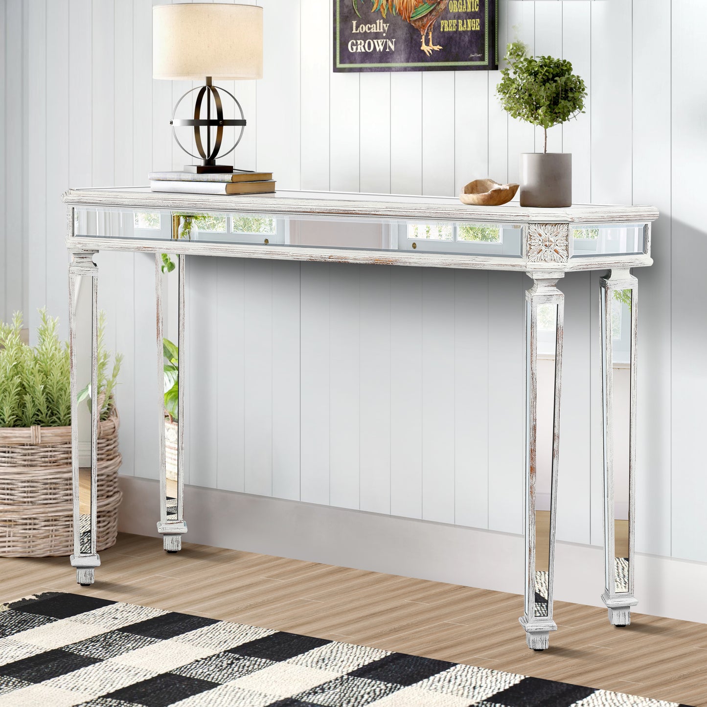 Antique white console table with mirrored accents and carved detailing